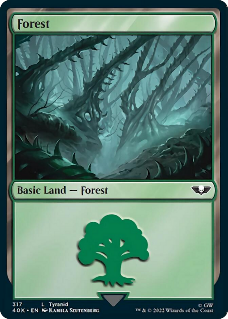 Forest (317) (Surge Foil) [Warhammer 40,000] | Jomio and Rueliete's Cards and Comics